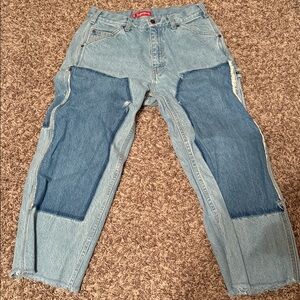 Levi's Men's Light and Dark Blue Patchwork Jeans with holes and cut shorter